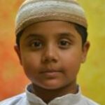 Boy picture with Islamic cap on head