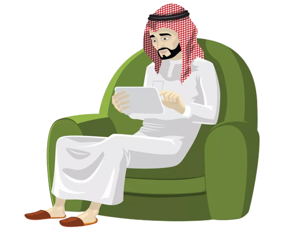 Person sitting on couch and reading Quran